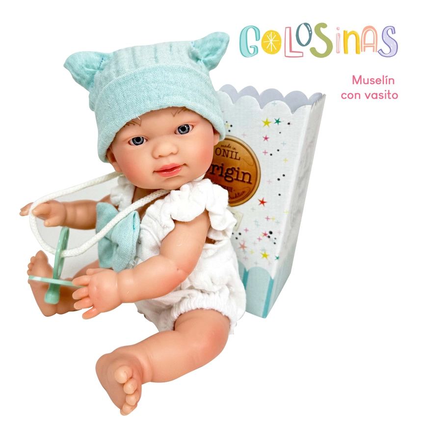 Golosinas Muselina doll with teal hat and pacifier, sitting next to a popcorn cup.